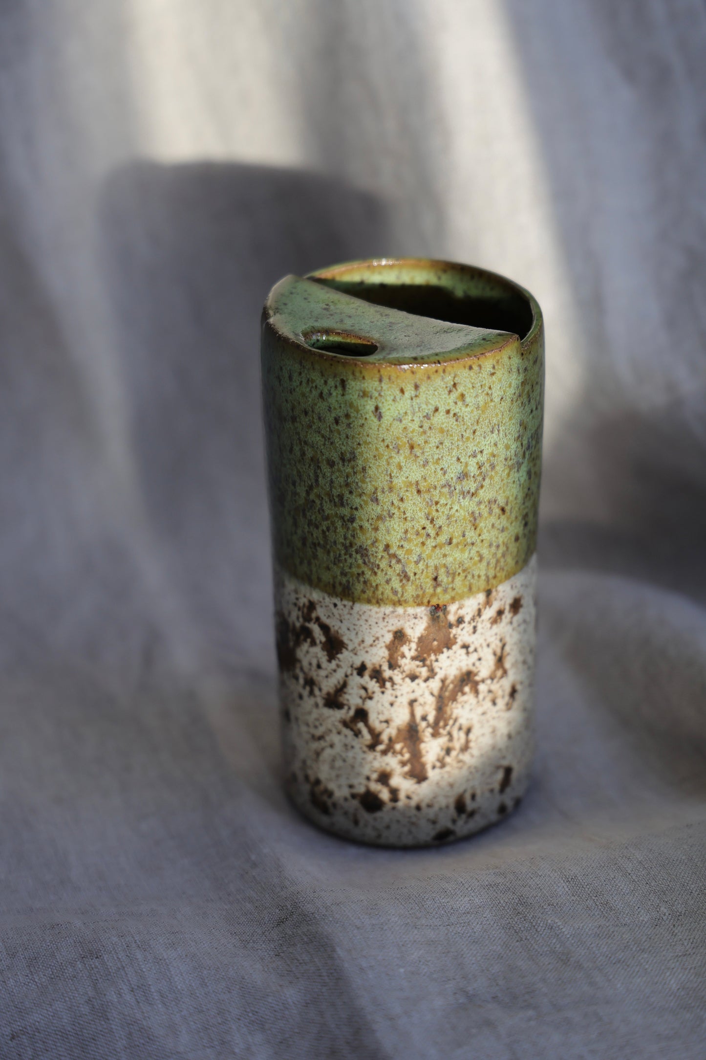 Green travel mug with creamy speckled bottom, Mustache Saver, Ceramic Stoneware Hand Thrown in Maine 14-16oz.