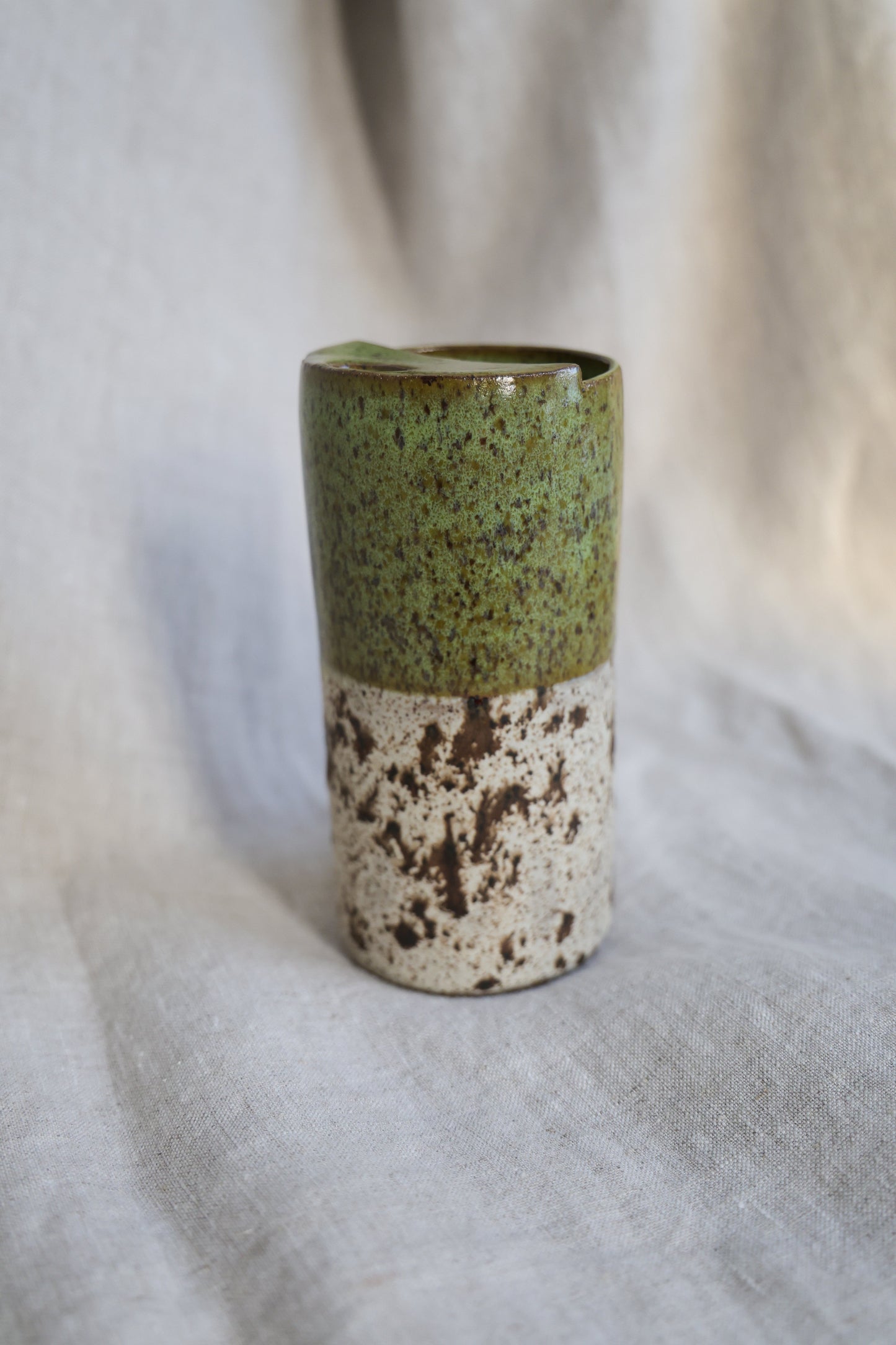 Green travel mug with creamy speckled bottom, Mustache Saver, Ceramic Stoneware Hand Thrown in Maine 14-16oz.