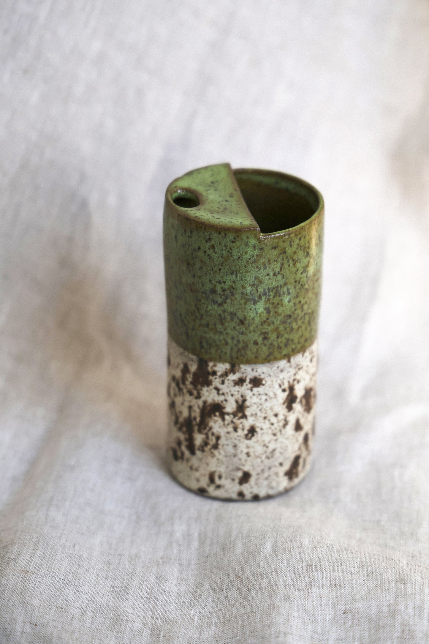 Green travel mug with creamy speckled bottom, Mustache Saver, Ceramic Stoneware Hand Thrown in Maine 14-16oz.